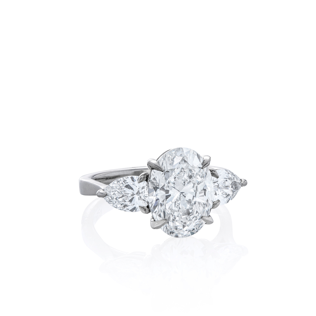 Platinum Oval Diamond Engagement Ring with Pear Shape Side Stones | LMFJ